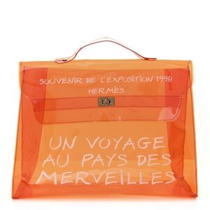 HERMES Vinyl Souvenir De L'Exposition Kelly Orange